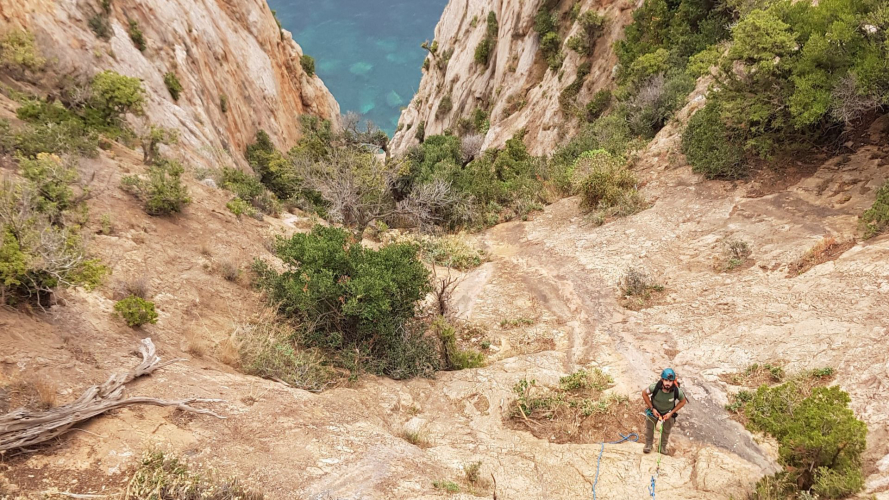 Person dry canyoning in the Porto Flavia fossil canal in south-west Sardinia