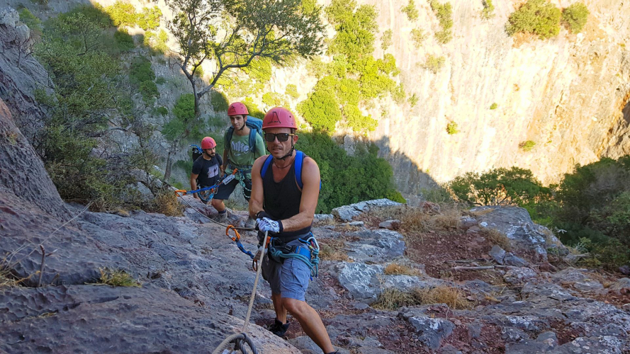 Group of people abseiling in the Iglesias area in south-west Sardinia