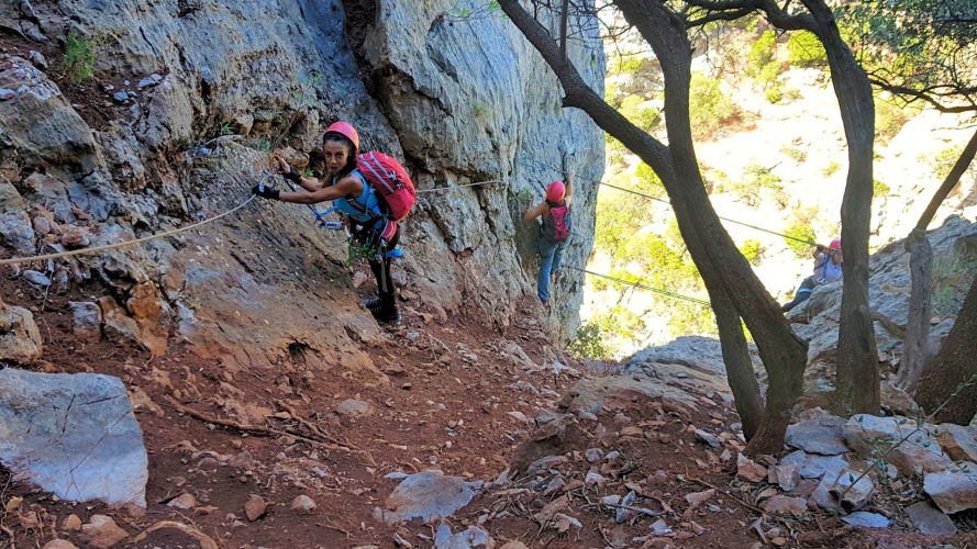 People abseiling at Gutturu Xeu in the Sulcis Iglesiente area