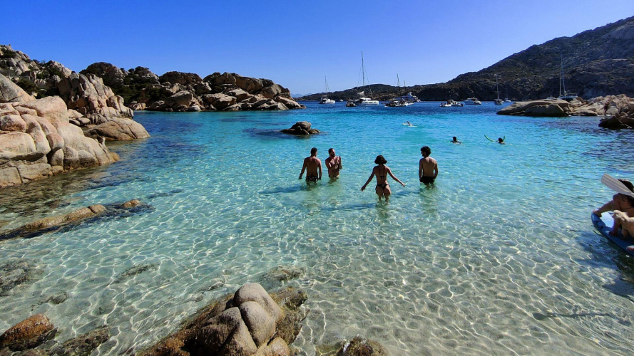 Hikers take a swim in Coticcio Cove