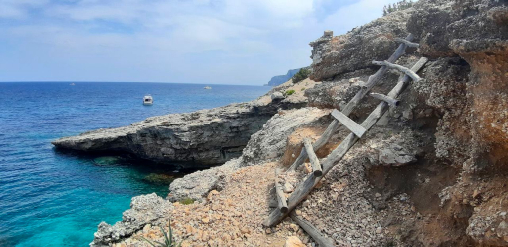 trekking route or walk with a view of the crystal blue waters of Cala Mariolu beach