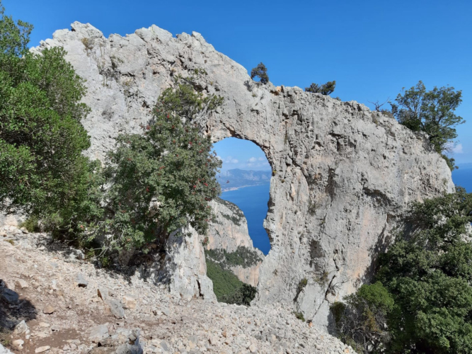 natural window in the rock in Baunei trekking Cala Mariolu