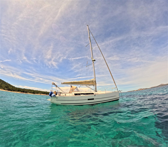 <p>Sailing boat in the turquoise sea in the Archipelago of La Maddalena</p><p><br></p>