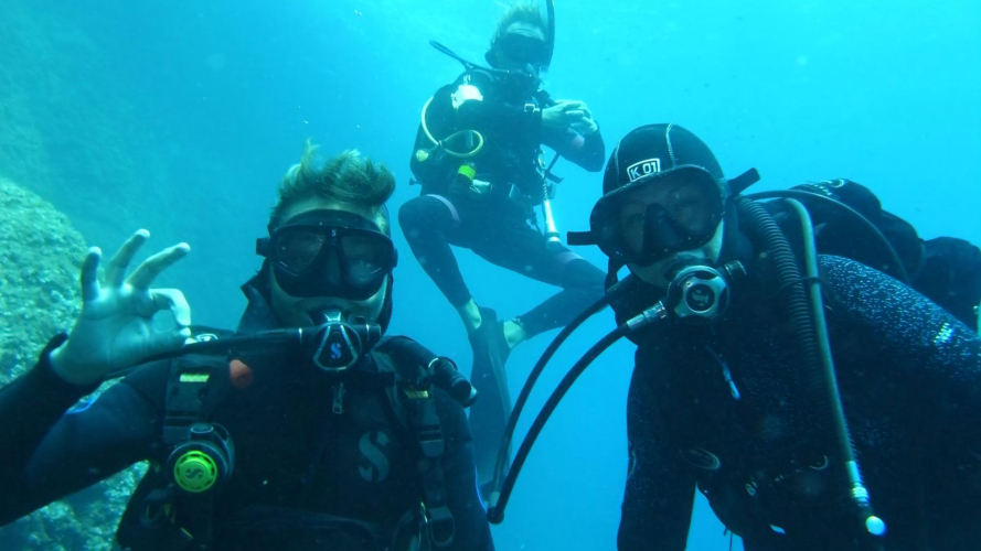 People while diving in the sea of Alghero