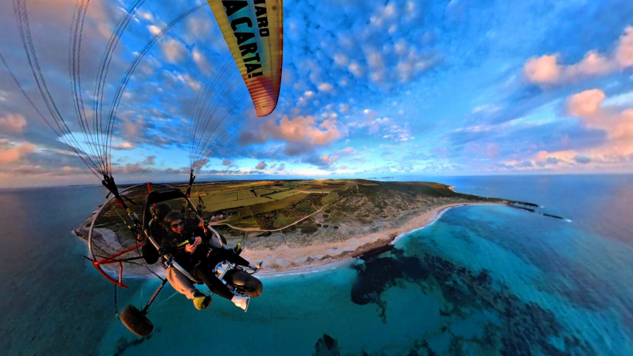 Powered paragliding flight over the west coast of Sardinia
