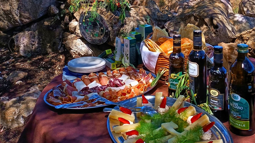 Produits locaux typiques offerts lors d'une dégustation d'huile à Alghero