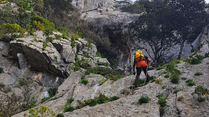 Person climbs Mount San Giovanni in Gonnesa