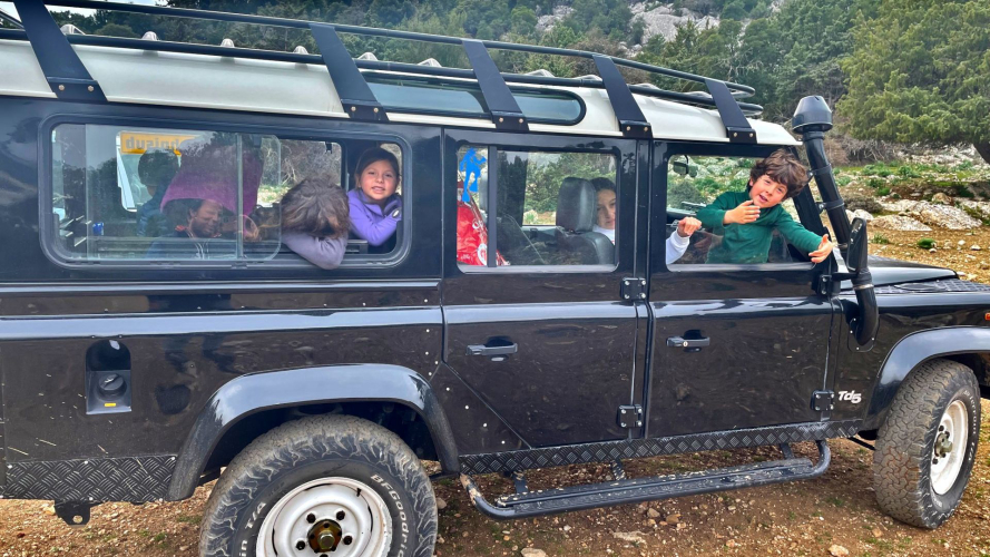 People aboard the off-road vehicle during the excursion to Dorgali