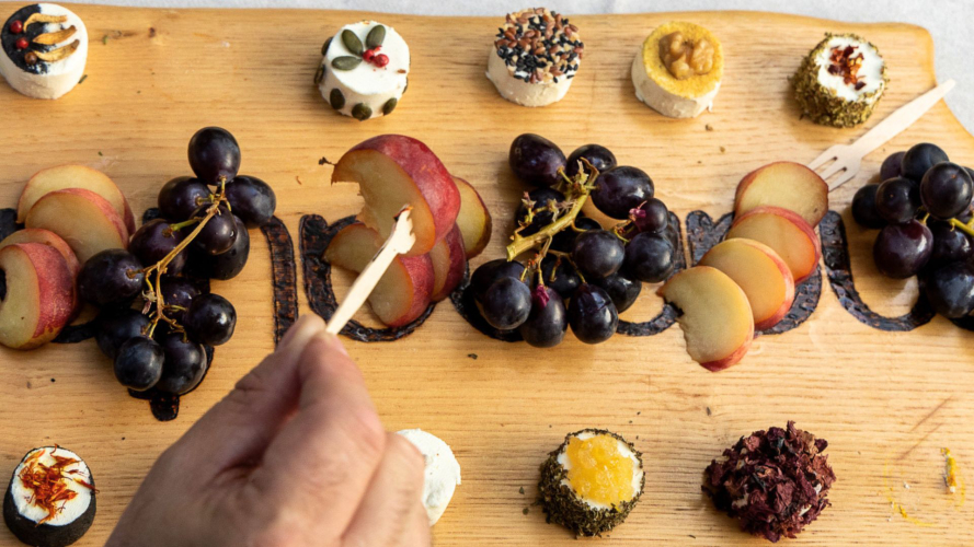 Selection of goat cheeses paired with local products during the tasting in Oliena
