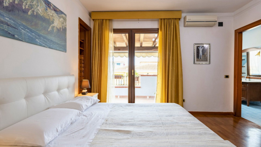 Camera da letto nell'alloggio ad Arbatax