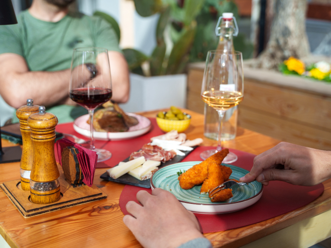 Tapas of fresh Sardinian products combined with wine