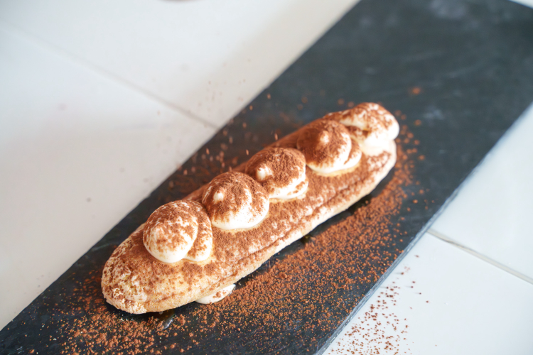 Chef presentation of Tiramisù prepared during the cooking class in Olbia
