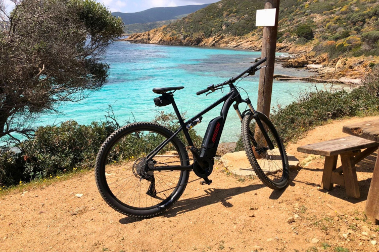 An electric bike rented in Porto Torres for a tour of the island of Asinara, between nature and wild animals.