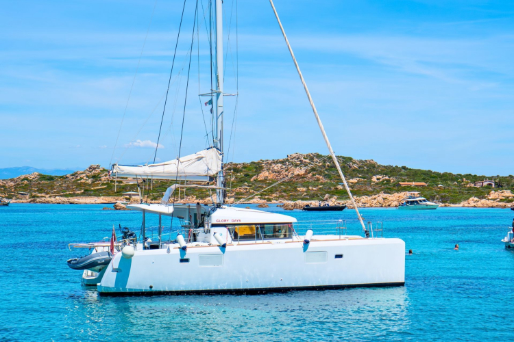 Luxury catamaran in the La Maddalena archipelago with iconic bays and beaches, swimming opportunities and snorkeling.