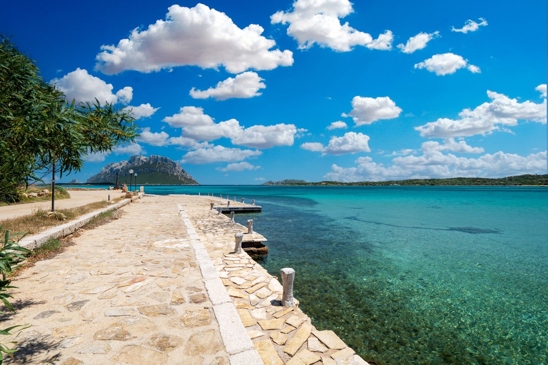 A modern shuttle bus connects Olbia airport to San Teodoro, offering a simple and uncomplicated transfer service.