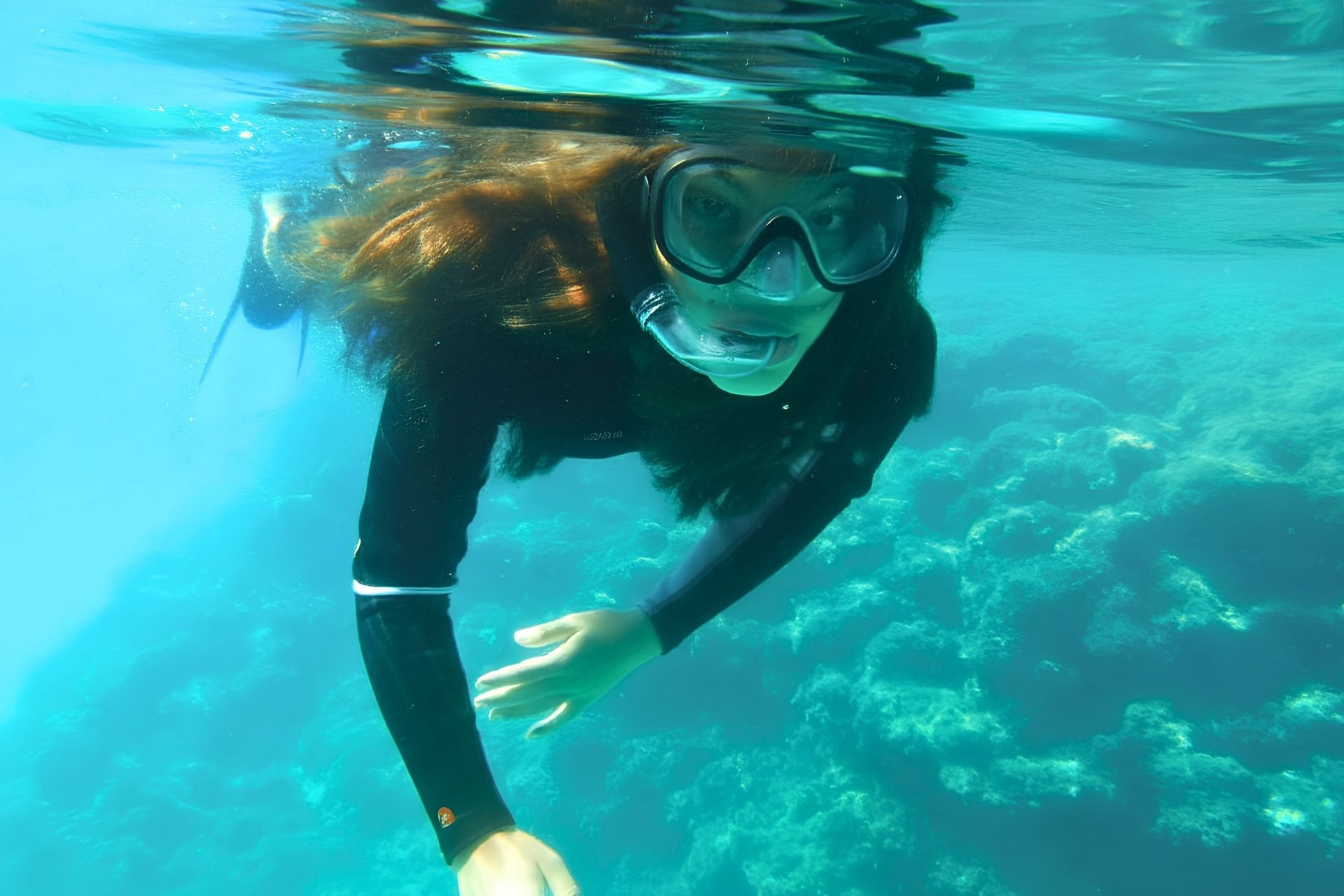Girl during snorkeling excursion in Balai