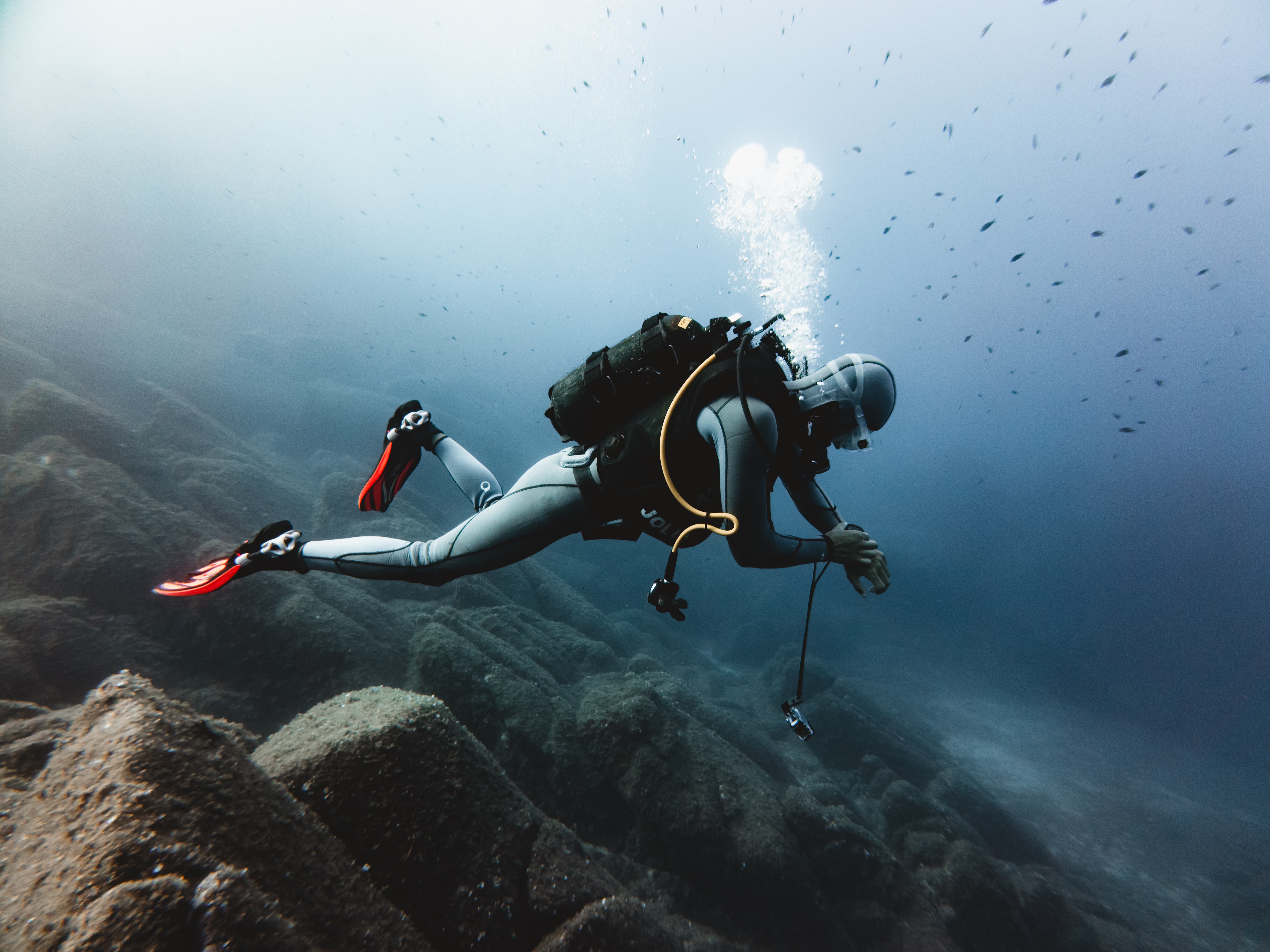 Underwater baptism experience with boat transfer from Cannigione to the La Maddalena Archipelago, including instructor and equipment, diving up to 12 meters.