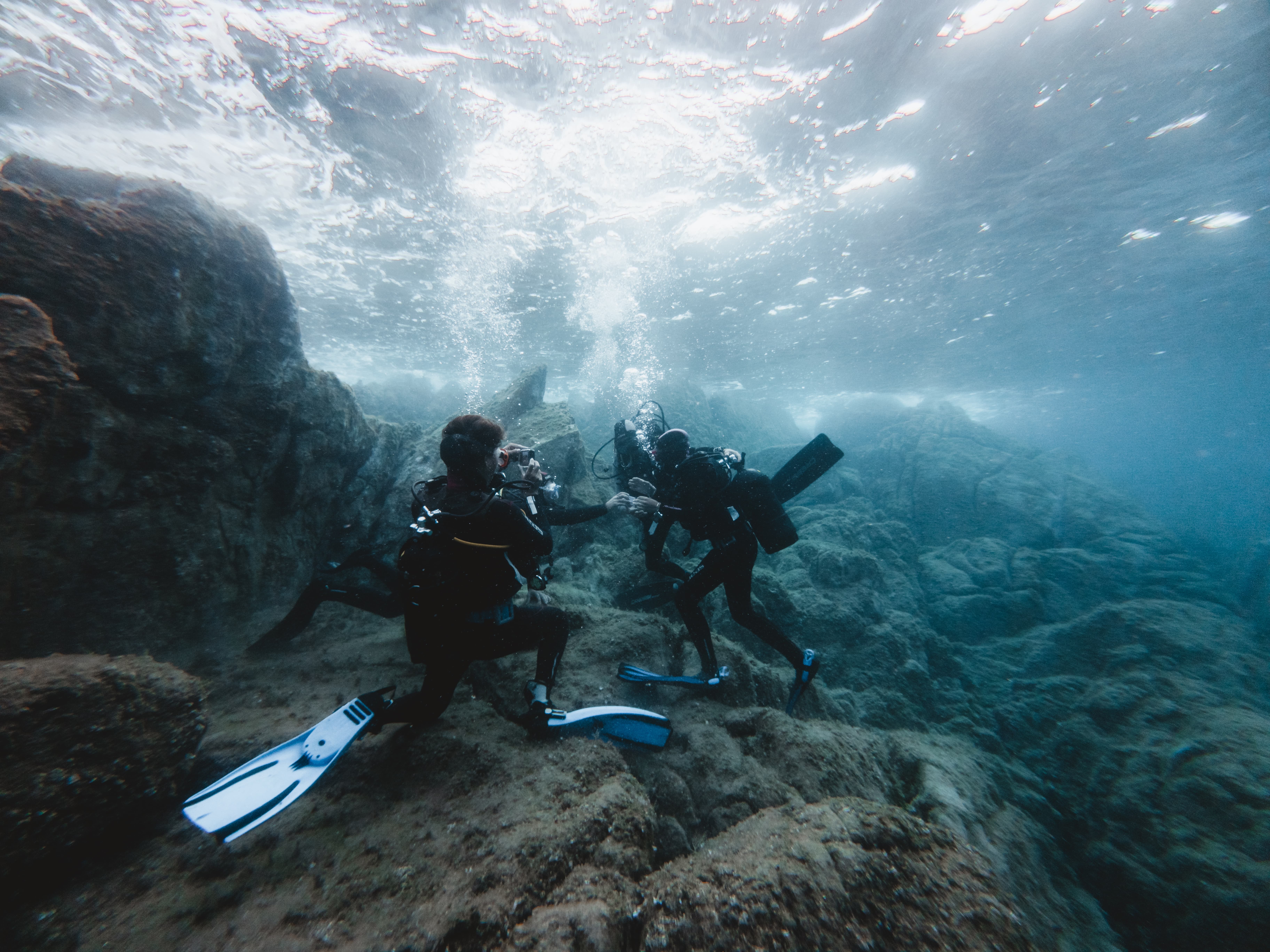 Underwater baptism experience with boat transfer from Cannigione to the La Maddalena Archipelago, including instructor and equipment, diving up to 12 meters.