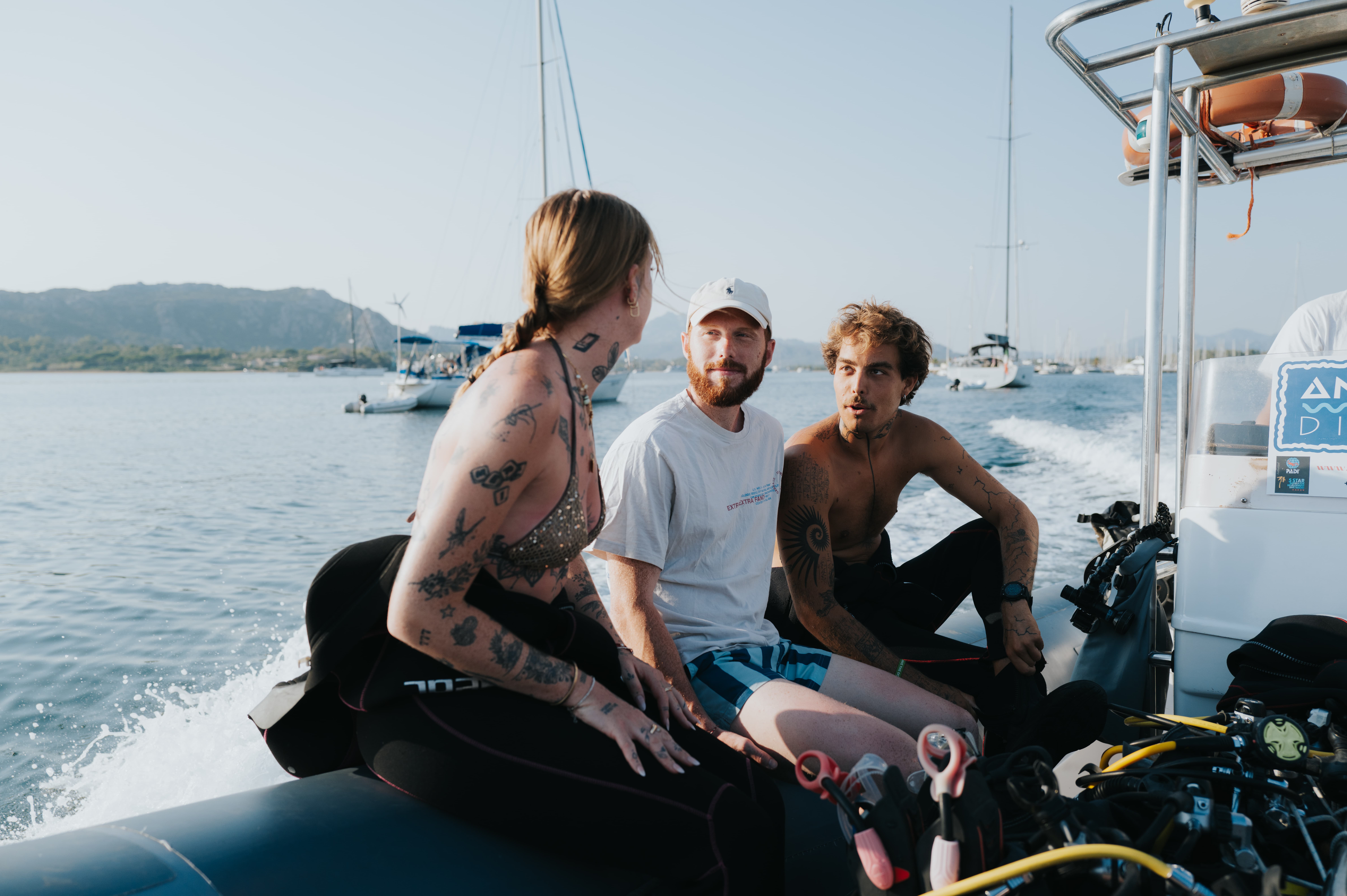 Underwater baptism experience with boat transfer from Cannigione to the La Maddalena Archipelago, including instructor and equipment, diving up to 12 meters.