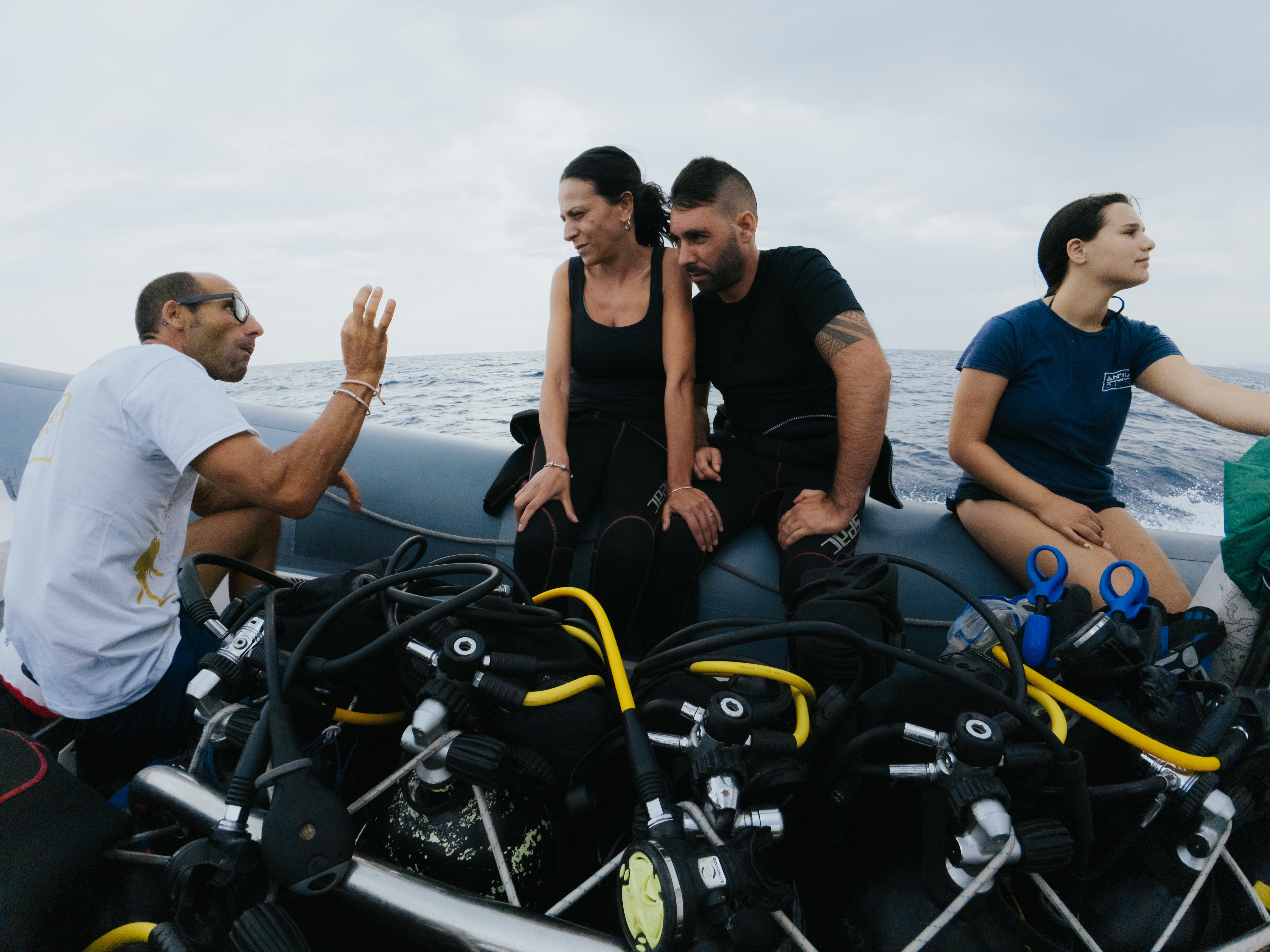 Underwater baptism experience with boat transfer from Cannigione to the La Maddalena Archipelago, including instructor and equipment, diving up to 12 meters.