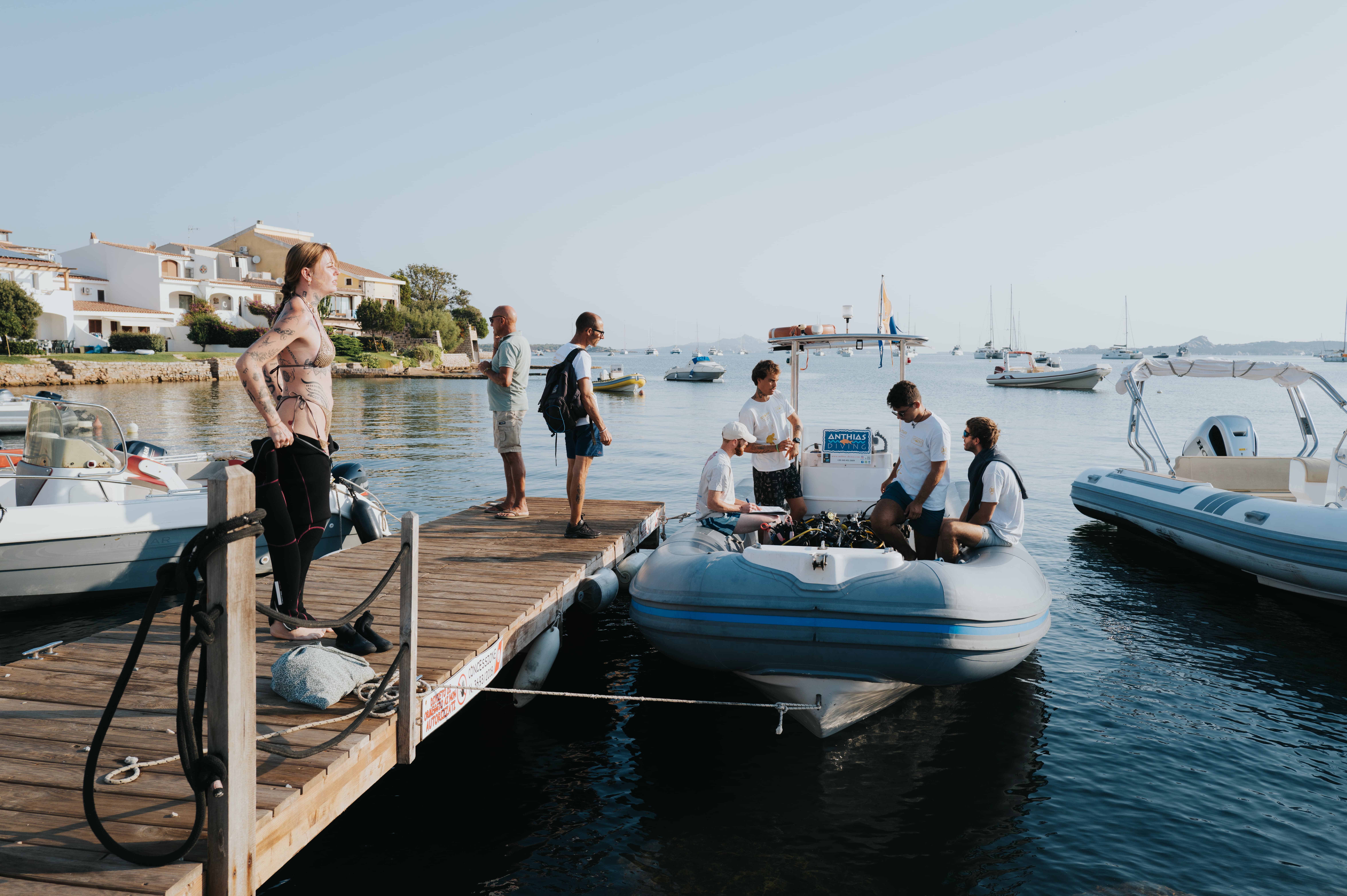 Underwater baptism experience with boat transfer from Cannigione to the La Maddalena Archipelago, including instructor and equipment, diving up to 12 meters.