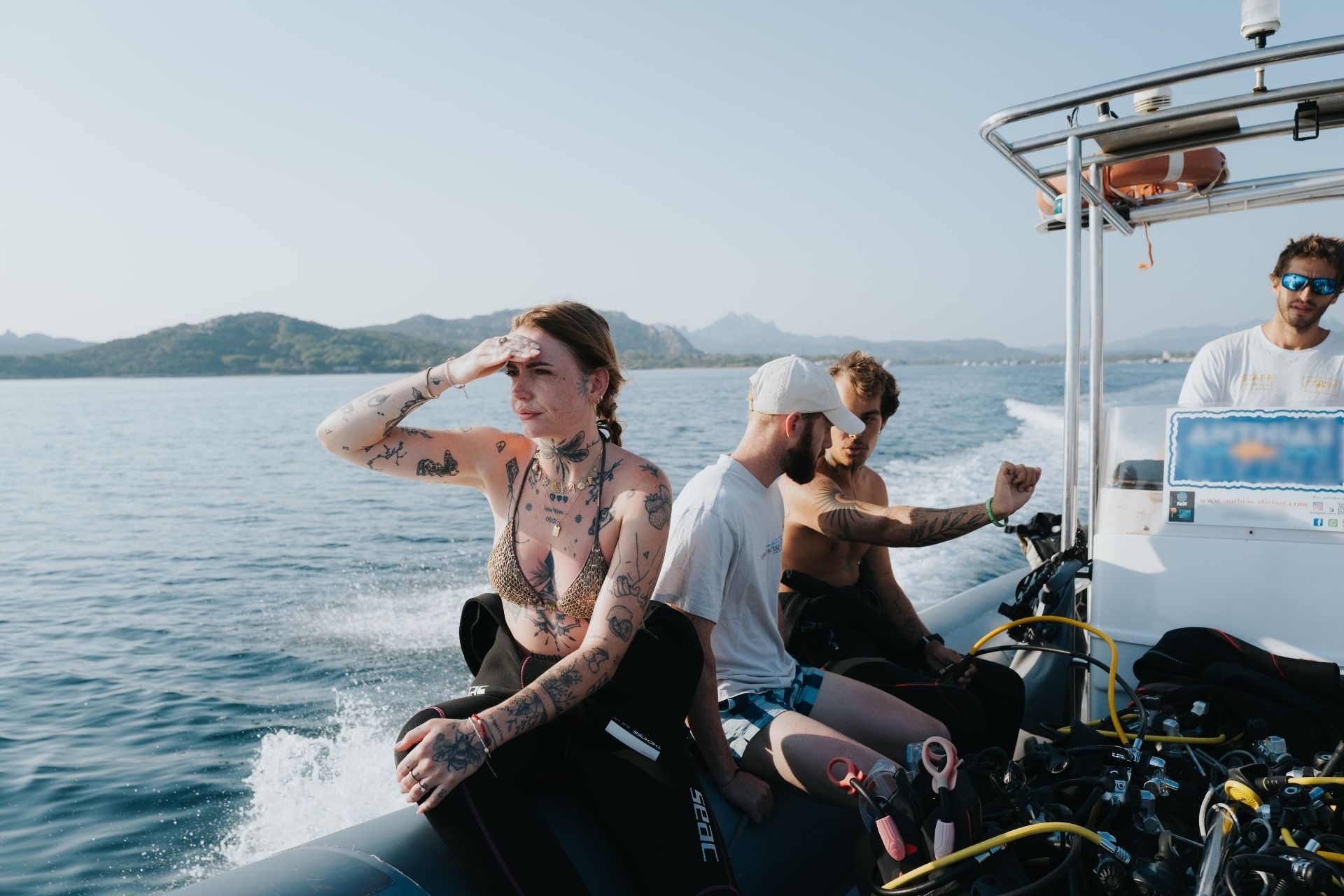 Underwater baptism experience with boat transfer from Cannigione to the La Maddalena Archipelago, including instructor and equipment, diving up to 12 meters.