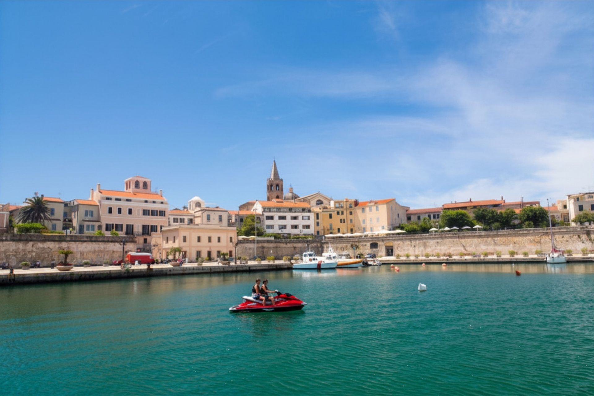Jet skis hurtling over the waters off the coast of Alghero