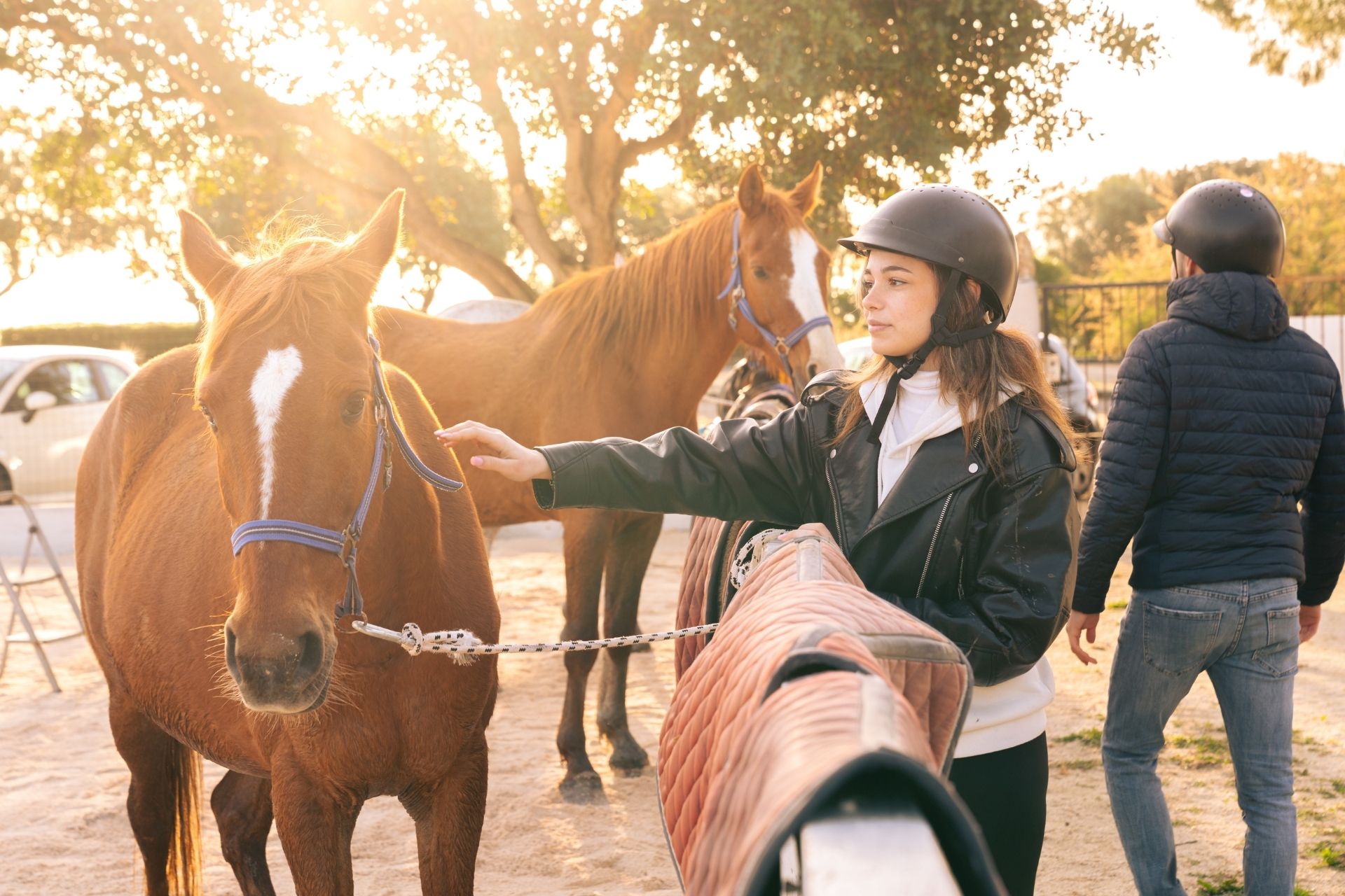 Horseback ride on the beach of Orosei at sunset, at the mouth of the Cedrino river.