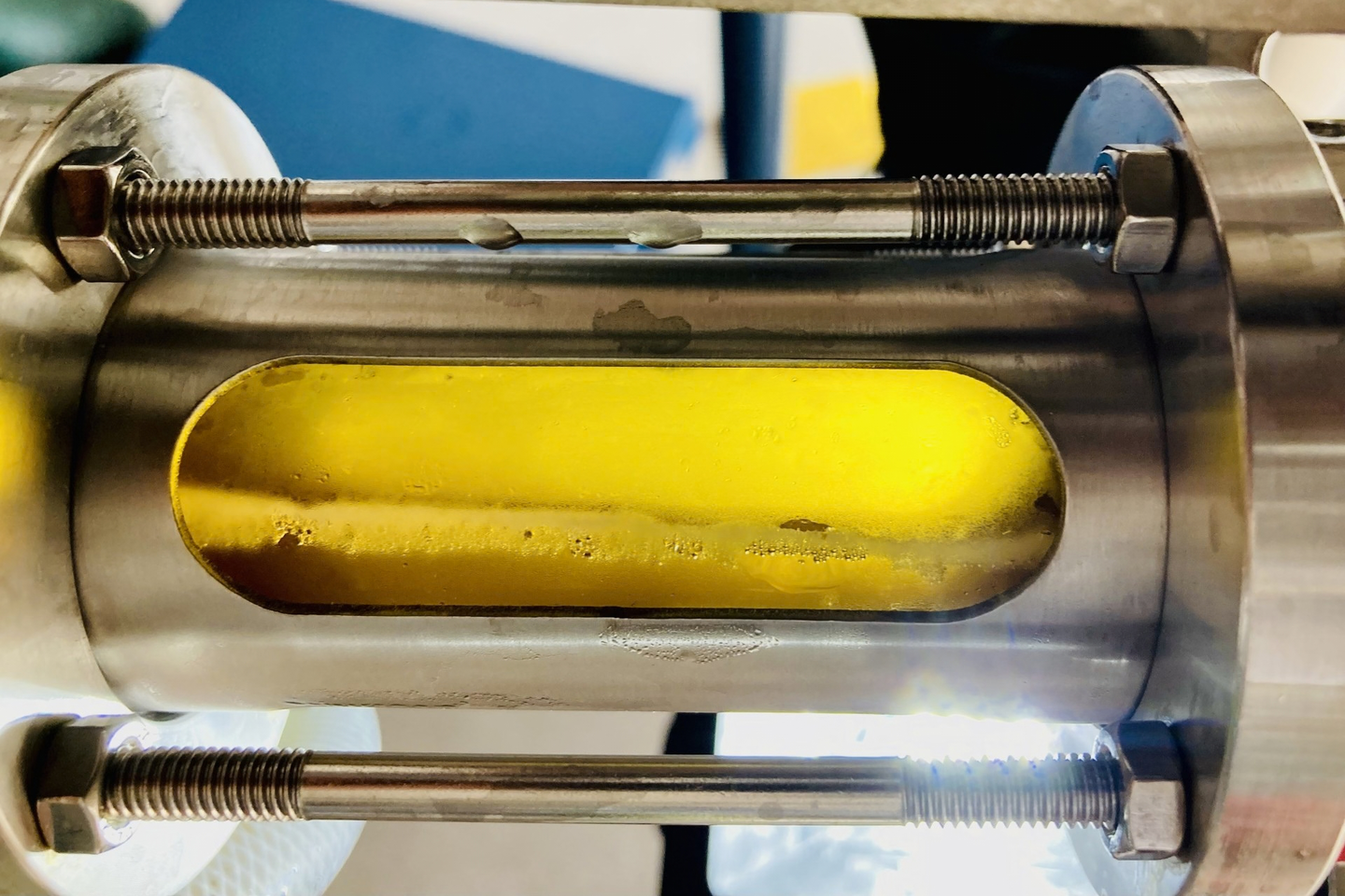 Passage of beer through the filter ducts inside the beer processing room in Perfugas